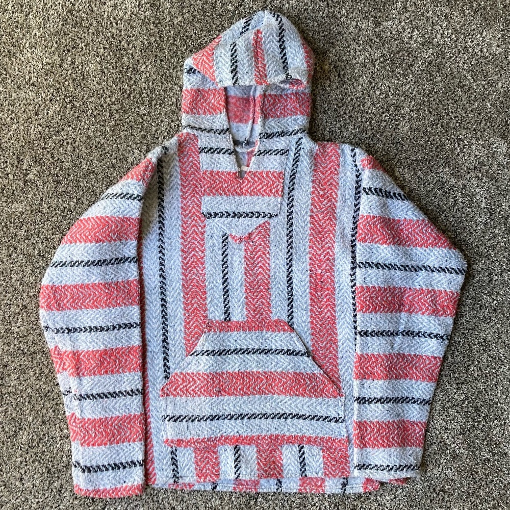 Red and blue poncho with hood and pocket